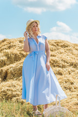 Obraz premium Plus size model in cotton dress. Fashion concept, clothes for l- xl size