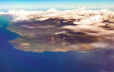 Volcano views from airplane, in Bali Indonesia