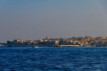 Fototapeta premium Syracuse, Sicily, Italy The view of Ortygia island from the sea.