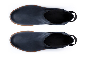 Boots isolated on white background. Top view.