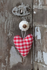 Red White Fabric Heart Hanging From Knob
