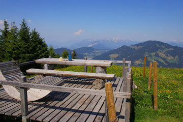 Fototapeta na wymiar A resting place on Schatzberg mountain with a beautiful view, Tyrol - Austria