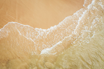 Aerial view of beach, sea waves and sand on baltic coast beach, nature background
