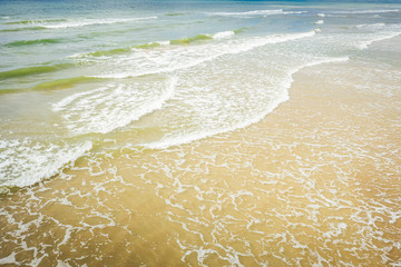 Aerial view of beach, sea waves and sand on baltic coast beach, nature background