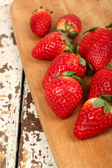 fresh strawberries on wooden table