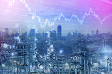 Fototapeta na wymiar Industry business background. Oil refinery with city and graphice stock chart multiple exposure.