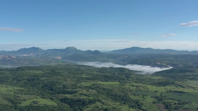 Above misty scenery with Veliki Krs Deli Jovan and Stol mountains 4K erial footage