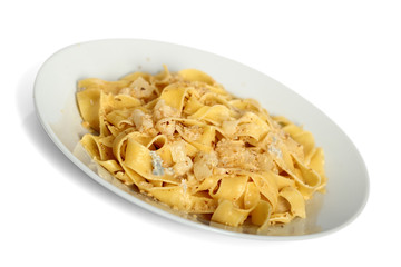 Pappardelle al Gorgonzola. Pasta (Fettuccine) with gorgonzola, pear, walnuts and white wine.