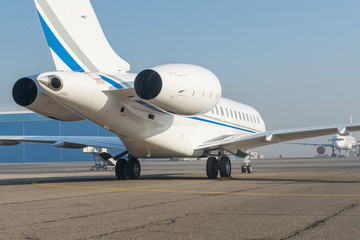 Business jet plane on the ground.