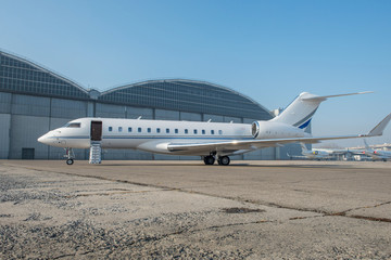 Business jet plane on the ground.