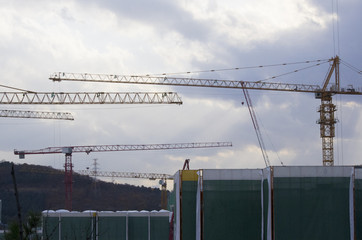 great crane at construction yard. ( the letters '2 tons' are just weight of the concrete block)