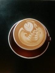 cup of coffee on black background