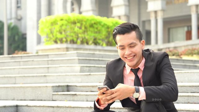 Office people joking and laughing.