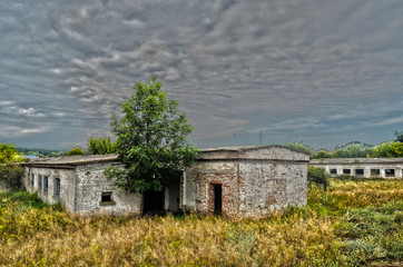 Fototapeta na wymiar Abandoned huge milk farm near Chernobyl Area. Kiev Region. HDR