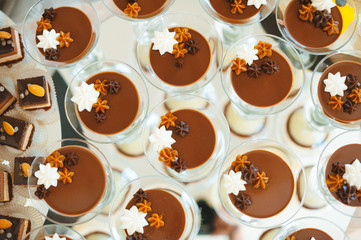 Tasty dessert pudding with chocolate on wedding table