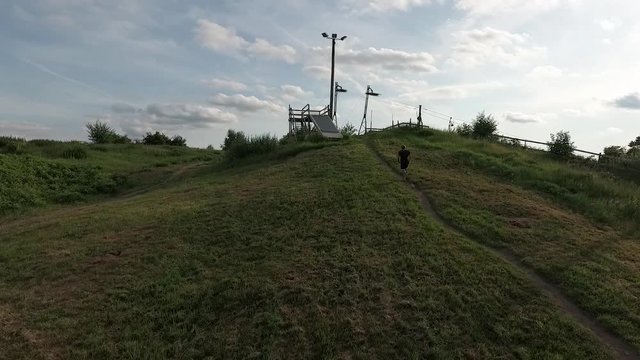Running up the hill a warm summerday