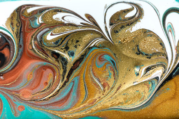 Bronze and gold marbling pattern. Golden marble liquid texture.