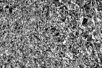 Silver foil background shiny crumpled surface for background