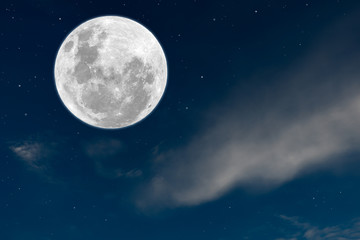 Full moon on night sky with white cloud.