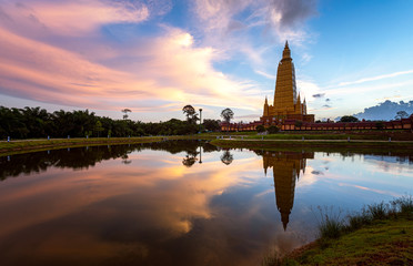 Fototapeta premium Beautiful nature with sunrise reflection on water at Wat Bang Thong ,famous temple in Krabi, Thailand