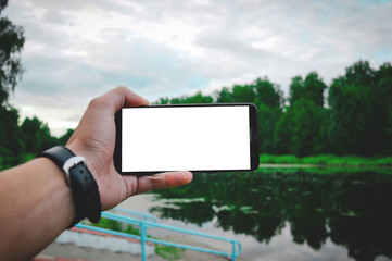 hand holding tablet pc with blank screen