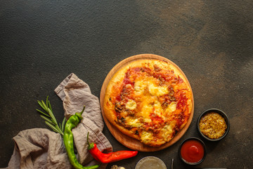 pizza, mushrooms, olives, chicken, tomato sauce, cheese, (ingredients). hot pizza. Top view. copy space