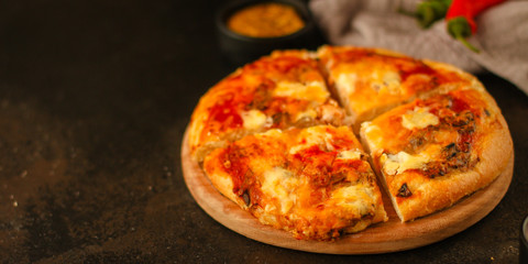 pizza, mushrooms, olives, chicken, tomato sauce, cheese, (ingredients). hot pizza. Top view. copy space