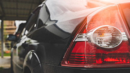 one side of taillight is broken by another car. © PIPAT
