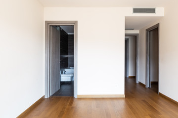 Front view of room with parquet and private bathroom access