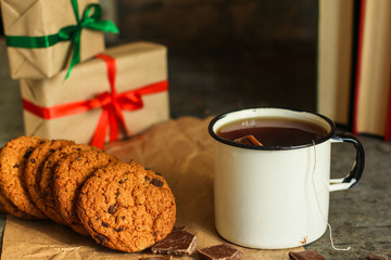 cup of tea with cookies (break, tea party, gifts) autumn, yellow foliage. top food background. copy space