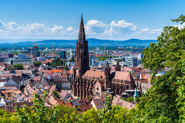 Germany, Red roofs and historical gothic muenster cathedral in famous student city freiburg im breisgau from above, no scaffolding in 2019 - obrazy, fototapety, plakaty