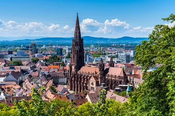 Germany, Red roofs and historical gothic muenster cathedral in famous student city freiburg im breisgau from above, no scaffolding in 2019 © Simon Dux Media