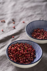 Close-up of pink pepper in a bowl
