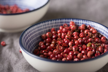 Close-up of pink pepper in a bowl