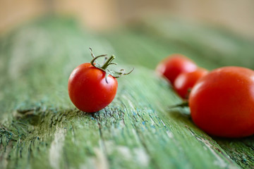 red tomato on a laid background close up