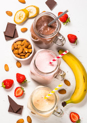 Set of milkshakes in mason jars.