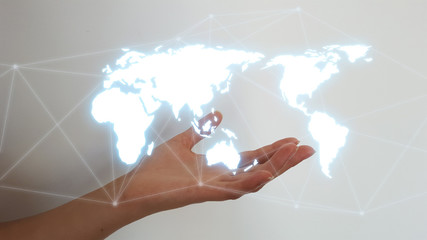 Businesswoman hand holding world map network hologram