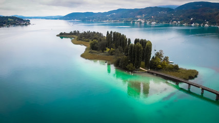 Aerial view of lake Worthersee in Portschach Am Worthersee town 