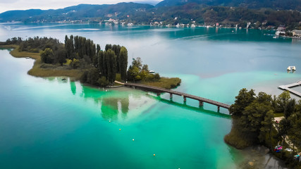 Aerial view of lake Worthersee in Portschach Am Worthersee town 