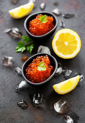 Fototapeta na wymiar Red caviar in bowls