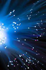 Fototapeta premium Glowing fiber channels in blue shades