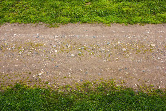 horizontal strip of green grass and dirt road, blurred focus Stock Photo |  Adobe Stock