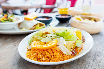 Enchilada with tomato rice, a mexican recipe