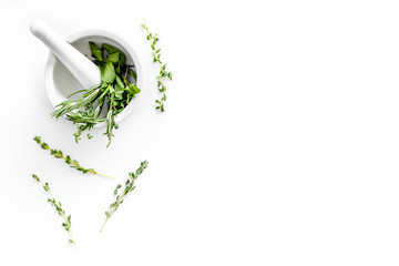 Alternative medicine with medicinal herbs on white background top view mock up