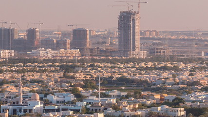 Aerial view to villas and houses near Golf course with lakes timelapse.