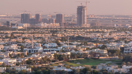 Aerial view to villas and houses near Golf course with lakes timelapse.