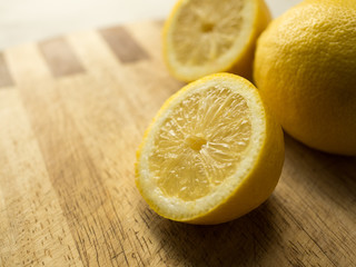 Close up of sliced ​​lemon on a wooden board
