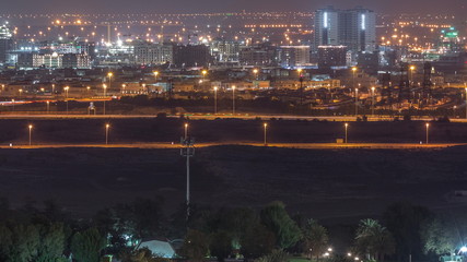 Aerial view to villas and houses near Golf course night timelapse