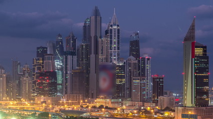 Dubai Marina skyscrapers and golf course night to day timelapse, Dubai, United Arab Emirates