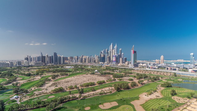 Dubai Marina skyscrapers and golf course morning timelapse, Dubai, United Arab Emirates
